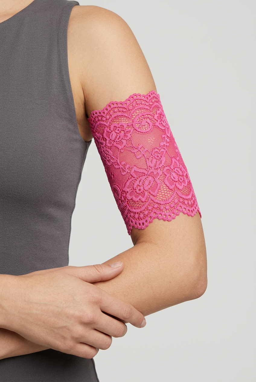 Hot pink lace cover modelled on the upper arm just above the elbow