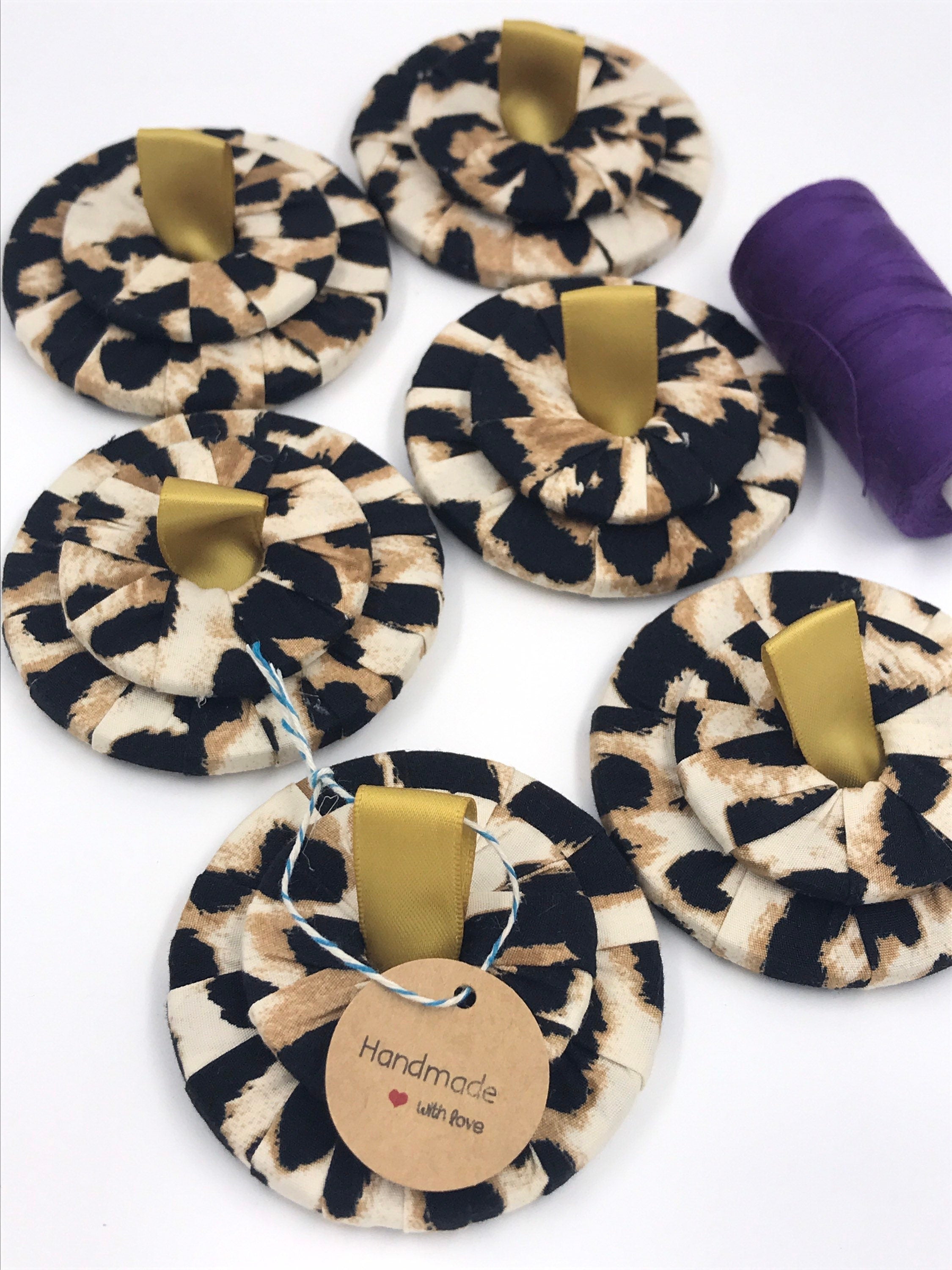 Set of 6 Hand Wrapped Fabric Steel Sewing Pattern Weights 70mm x 40 mm including ribbon Weighing average of 182g Great sewing gift.
