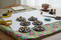 Leopard print sewing weights in craft scene