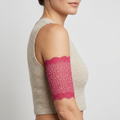 Pink Leopard lace cover on an adult model’s upper arm